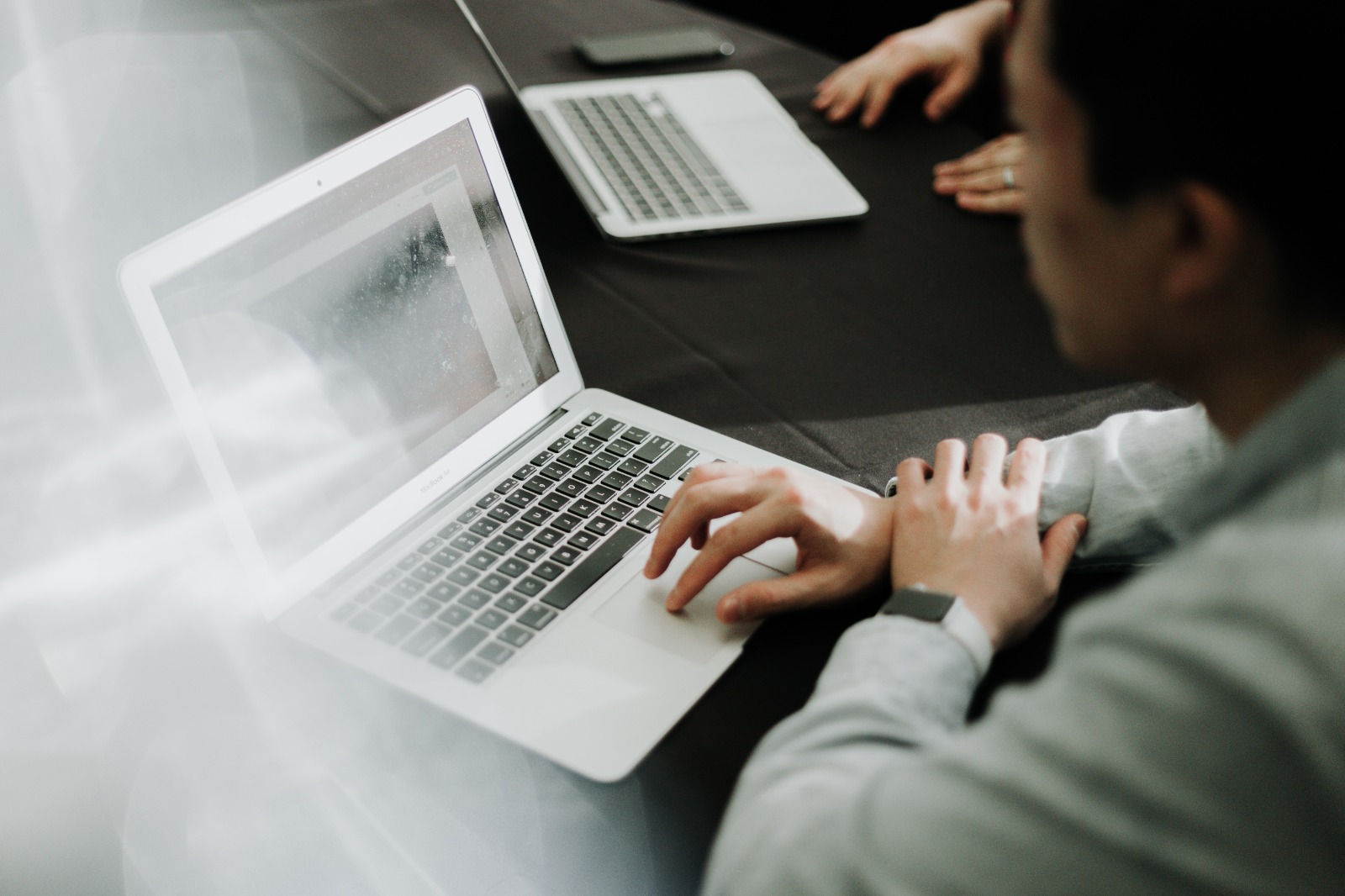 Image of Branding Agency Singapore personnel inspecting a website